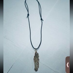 Arkansas mined natural crystal on adjustable leather necklace!